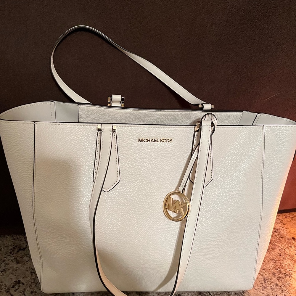 Brand new, Michael Kors tote with two removable clutch and wallet